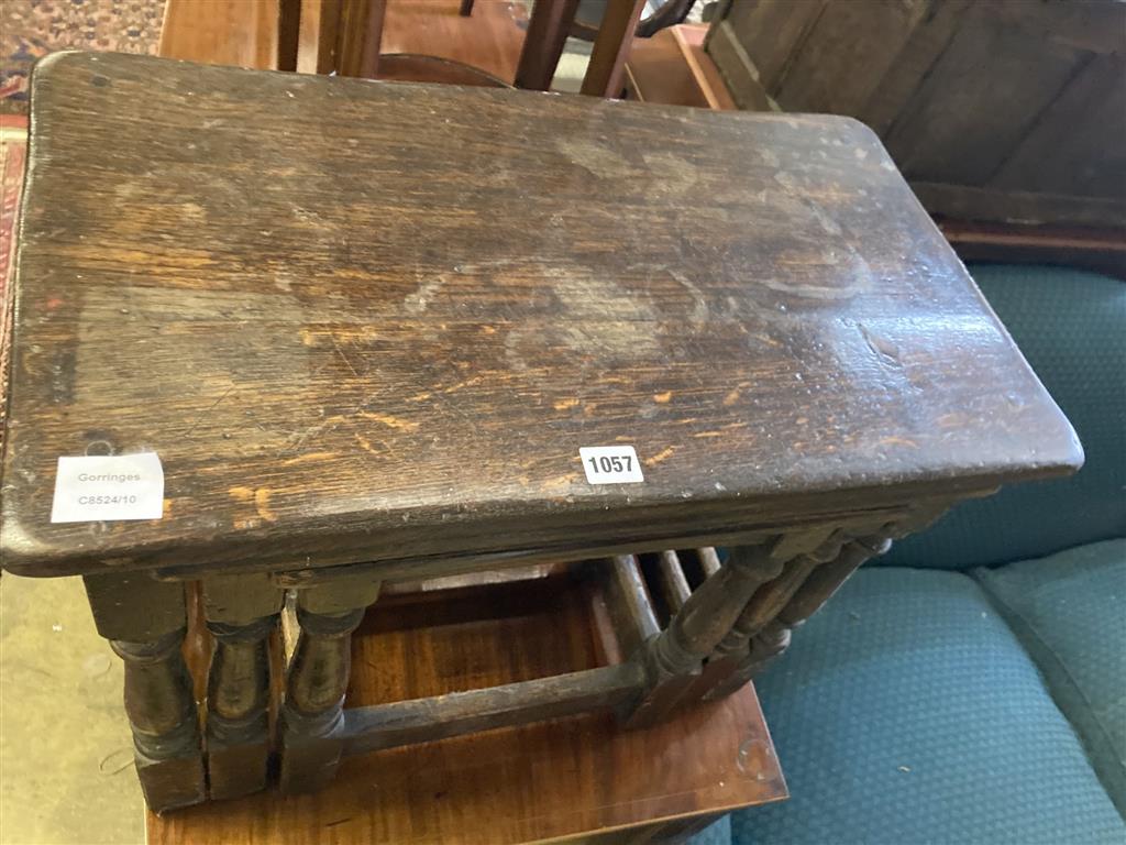 A nest of three 17th century style rectangular oak tea tables, width 61cm, depth 34cm, height 48cm